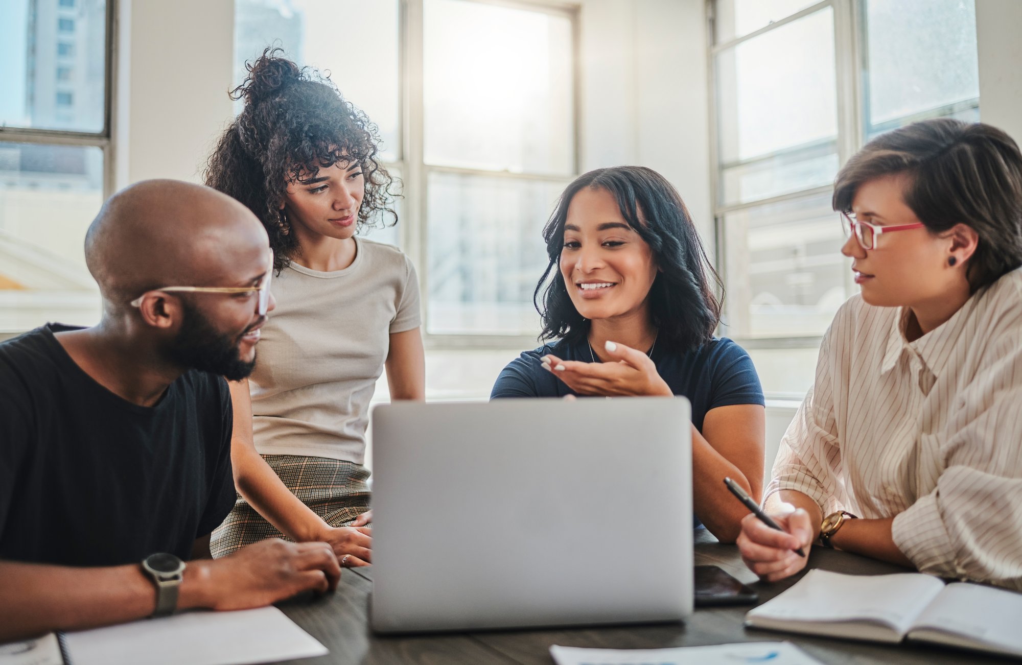 Laptop,-digital-marketing-and-team-in-a-meeting-planning-seo,-advertising-and-innovation-strategy-as-a-group.-Creative,-diversity-and-young-people-working-on-branding-ideas-for-a-startup-project-1430297912_7956x5180 Laptop,-digital-marketing-and-team-in-a-meeting-planning-seo,-advertising-and-innovation-strategy-as-a-group.-Creative,-diversity-and-young-people-working-on-branding-ideas-for-a-startup-project-1430297912_7956x5180