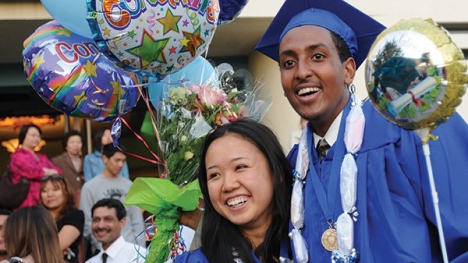 Students celebrate their graduation from Alameda Science and Technology Institute