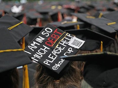 Graduation hats "I am in so much debt please help"