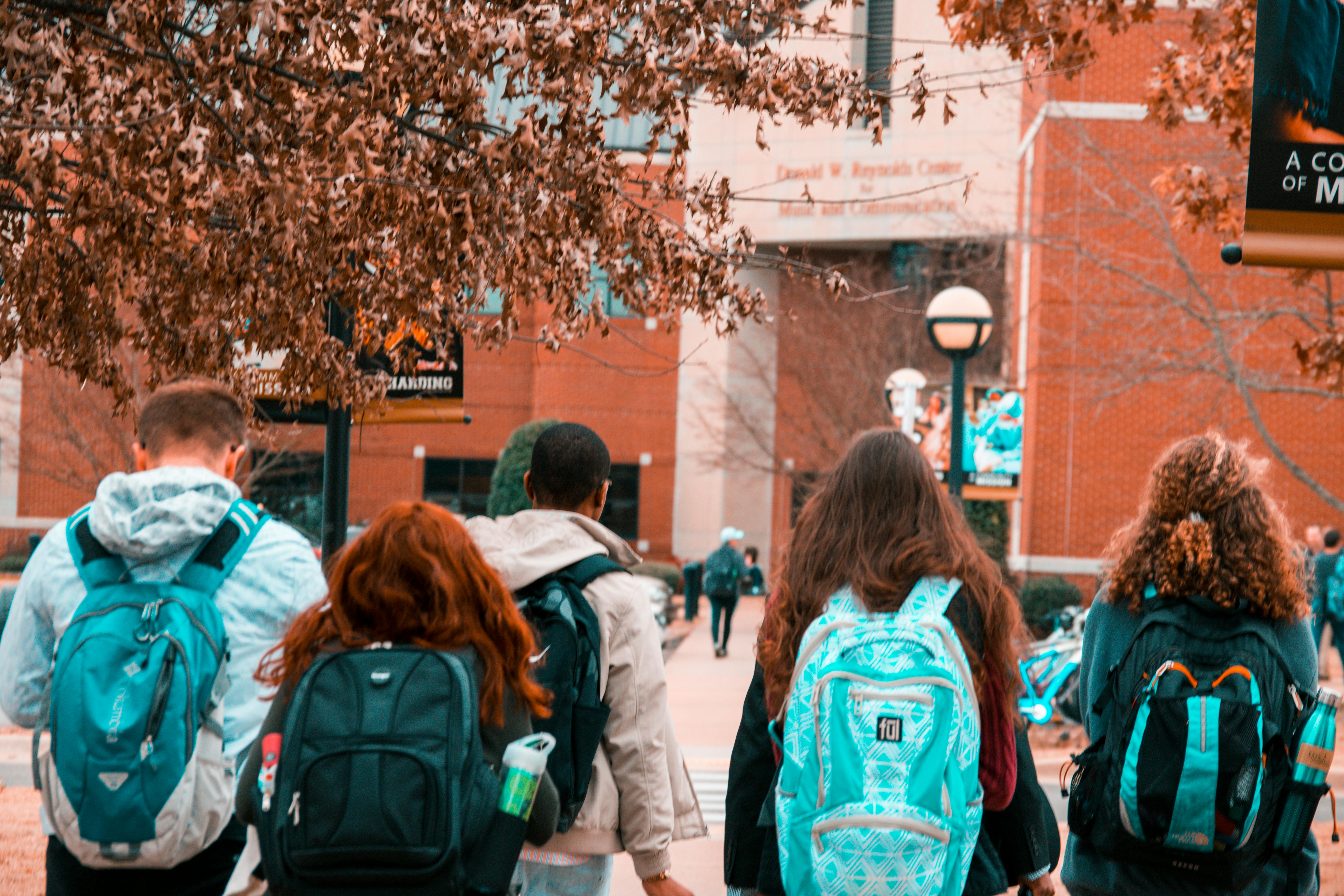 Image of people walking to a building