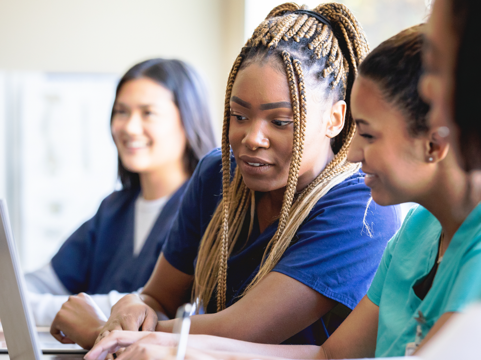 Diverse group of women are nursing or medical students at local university